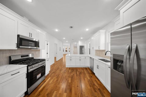 Photo of 319 William St #2, Harrison, NJ 07029 (MLS # 26032297)