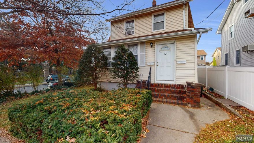 Great opportunity to invest in or own a 2-family home close to transportation to NYC. The possibilities are endless to make this property your own! Hardwood floors, spacious rooms, both kitchens equipped with dishwashers. The 1st floor unit has charming details with the original wood moldings. Features ample sized dining room and living room with den, 1 sizeable bedroom with large walk-in closet & 1 full bath. 2nd floor has 2 bedrooms & 1 full bath, added bonus on the 3rd floor which offers added storage as well as a large bonus room. Detached 1 car garage which allows for even more storage. Ideally located close to major highways, schools, shopping and parks. A mere 10 minutes to the GWB, ideal location for anyone that commutes into NYC. **Virtually staged photos intended to show the homes potential** ** Please note that the attic should not be considered finished or liveable space, town may require that it be removed.