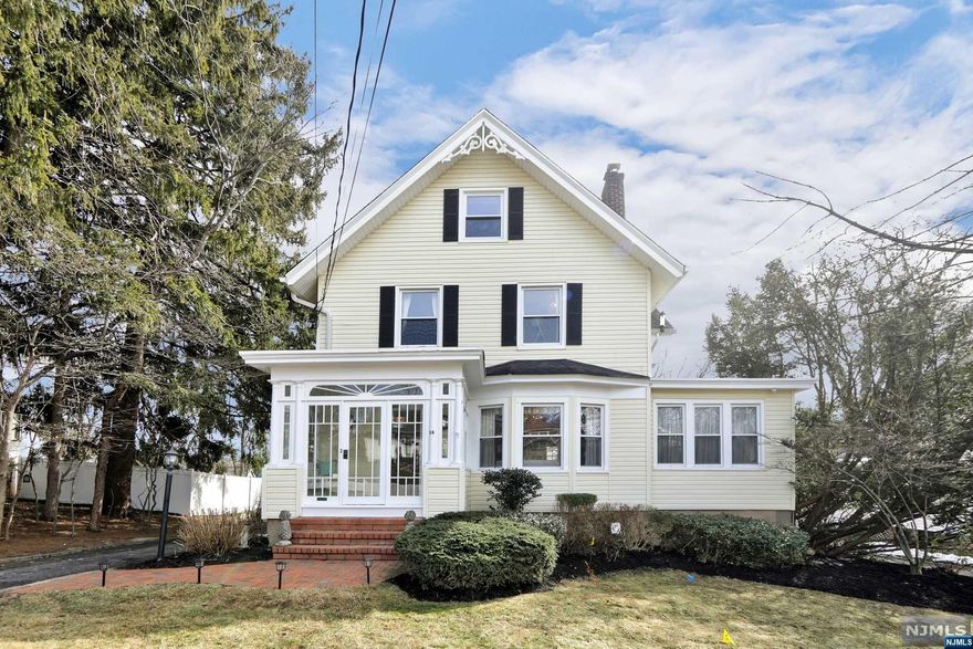 Welcome to this 1900s Colonial nestled in the heart of Caldwell! This elegant home boasts 5 bedrooms 2.5 bath, 2 car garage an oversized yard and timeless Colonial architecture that exudes character and charm. As you step inside you will be greeted with original hardwood floors, intricate moldings while the foyer and formal living room provide 9 foot curved ceilings with a wood burning fireplace. The formal dining room with gas fireplace offers an ideal space for hosting gatherings. The kitchen is bright and airy with a 10 ft granite island & additional space for desk/work area and french doors with second access point to the deck. Upstairs you will find 4 bedrooms including master suite featuring double vanity, jacuzzi tub, & skylights. Continuing to the 3rd floor will be a bedroom and multi purpose area. Full basement with high ceilings. New furnace in 2023 and NJ Energy Star insulation package. This Colonial gem offers the perfect blend of historic charm and modern convenience.