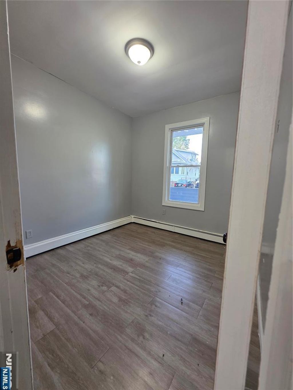 Photo of 34 8th Avenue, Paterson, NJ 07524 (MLS # 25035509)