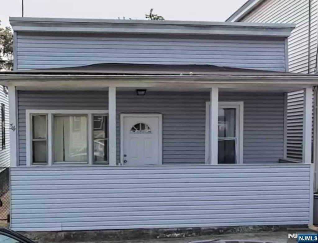 Photo of 34 8th Avenue, Paterson, NJ 07524 (MLS # 25035509)