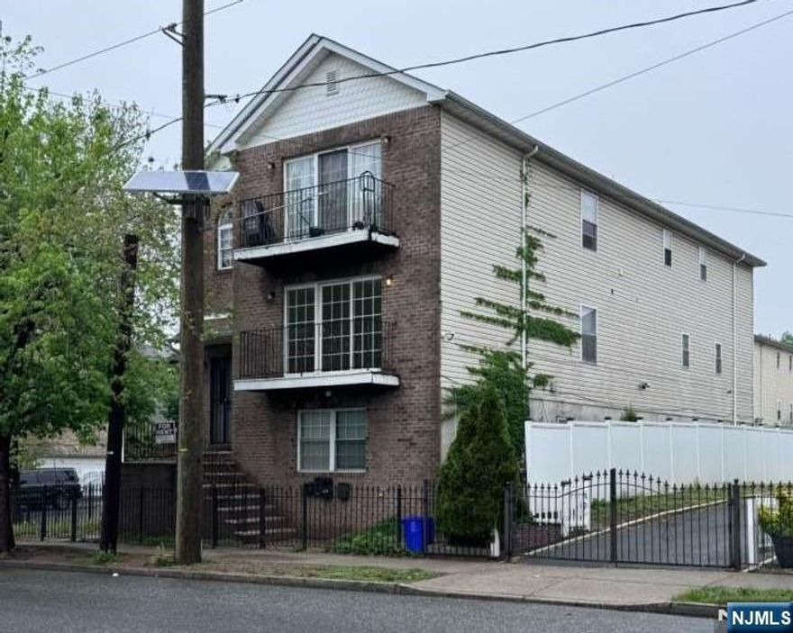 Do not miss this opportunity! This HUGE 2 unit house on a large corner lot and is in excellent condition!! There are very good tenants on the 2nd floor. This property boasts 9 bedrooms, 5 full bathrooms, and 3 kitchens in a versatile 2 apartment house. It is perfect for relatives who can utilize one apartment while renting out the other unit! Investors, this building is a money maker. The first apartment, located on the ground level, includes 1 kitchen, 1 bathroom, a dining area, a living room, and 3 bedrooms. Connected to the floor above, it offers 3 bedrooms, 2 bathrooms, a living room, a dining area, and a kitchen. The second apartment features 3 bedrooms, 2 bathrooms, a living room, and a dining room. It is also conveniently close to transportation and major highways. View today.