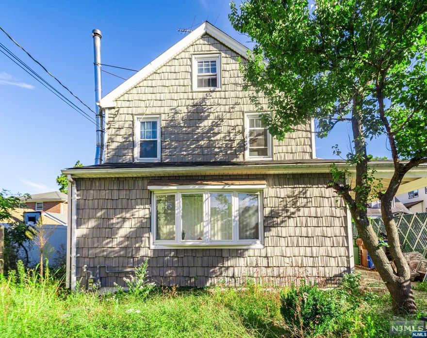 Welcome to your new home! Footsteps away from the train station, this makes this a great home for commuters and those looking for privacy at home. Property sits on A 40X100 lot and has a ton of potential. Come turn this house into a home before someone else does!