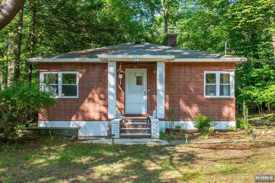 YOUR SEARCH ENDS HERE! Welcome to this beautiful and cozy 2 bedroom, 1 bath home. Walk through the front door into the spacious living room that leads to the eat-in kitchen with new appliances. Hardwood floors, 2 walk-in closets, full basement, new garage, and private yard built on .24 Acres. Close to NJ Transit and public transportation. Steps away from famous hiking trails and state parks such as: Weis Ecology Center, Appalachian Trails, and Botanical Gardens. THIS HOME IS A MUST SEE!!