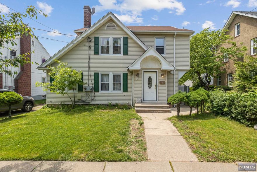 Conveniently located near major highways, public transportation, and restaurants & shops, this single-family home, with plenty of character, awaits in the lovely residential neighborhood of Teaneck, NJ. The property features 4 well-lit bedrooms and 3 tastefully updated bathrooms, including a full bath found in the finished basement with a kitchen. A formal dining, living room, full bathroom, and kitchen complete the main living area. Hardwood flooring throughout, first floor laundry, and a spacious first floor living area are some highlights this charming home has to offer. The long driveway offers privacy and leads to a detached 2-car garage. The fenced-in backyard provides ample space for playing and entertaining.