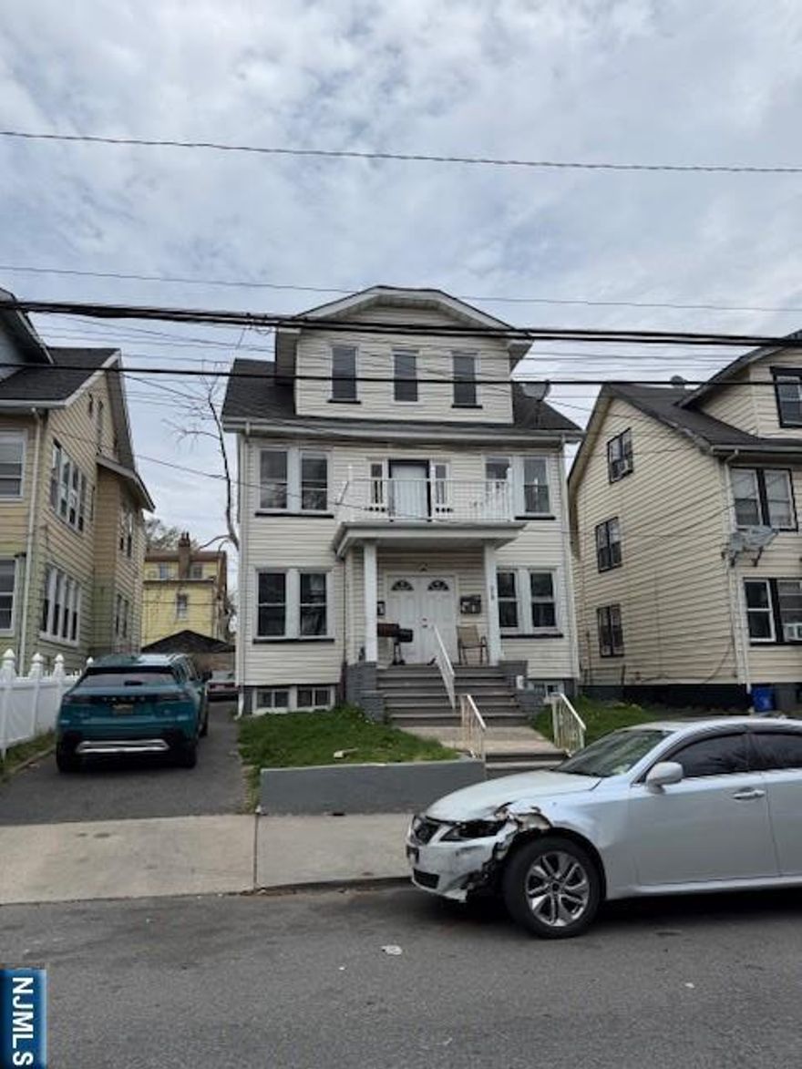 Legal 3 fam with driveway, great condition, all separate utilities, perfect for investors or first time homebuyers, great area close to major highways and public transportation, shops etc. minutes from Downtown Newark. Priced to sell, it wont last.