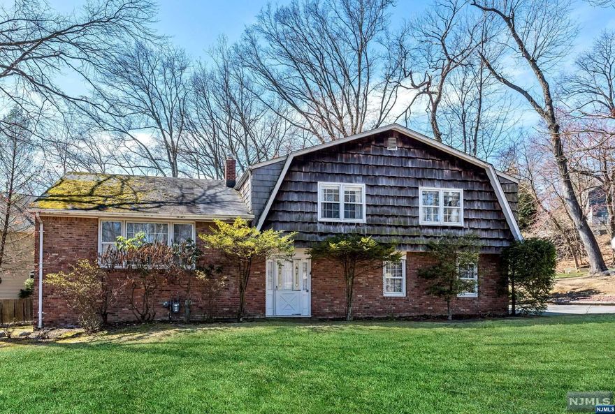 Opportunity Knocks! Space abounds in this over-sized Sugar Maple Split-Level home awaiting your finishing touches. Highlights include hardwood floors beneath carpeting, King-Sized Primary Bedroom with en-suite bath, three generous guestrooms, updated hall bath, family room with fireplace, ground floor office, and attached two car garage. All this located on a quiet cul-de-sac!