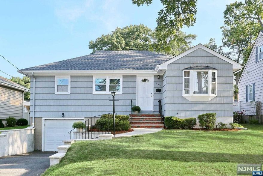 Welcome to this charming one-story ranch-style home in the desirable town of Waldwick. This home features spacious living room with dining area and eat-in kitchen provides ample space for preparing meals. The home boasts three comfortably sized bedrooms and a full bath. Step outside onto the deck accessible from the kitchen and admire the peaceful fenced yard. Downstairs you'll find a partially finished basement providing excellent potential for additional living space. The basement also houses a convenient laundry/storage area and offers direct access to the attached garage making parking and storage a breeze. Situated near a Blue Ribbon elementary school and a town park this home offers an ideal location. Amenities include hardwood floors on main level, freshly painted, new roof and comes equipped w/central air for comfort. With endless possibilities to create your dream home, here's your chance to make this house truly your own. Don't miss this opportunity, come visit today!