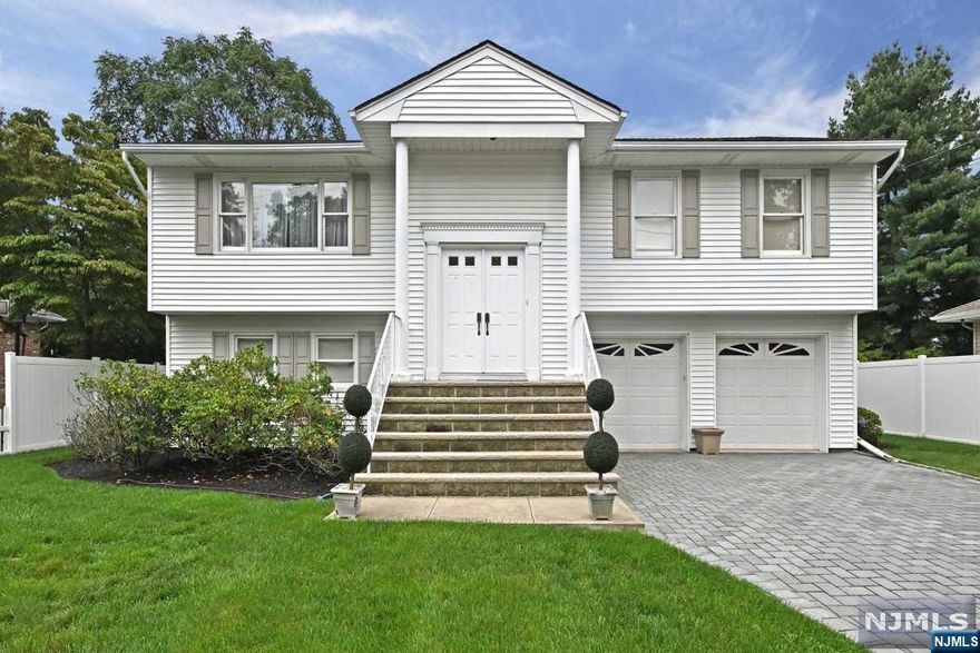 3 BRs & 2.5 bathrms. Great curb appeal! Double car wide paver driveway to 2 car garage! High ceiling entry foyer welcomes you & your guests! Open layout of the main flr allows for connected living w/your family :) Large living rm, large dining rm, large eat-in kitchen. Large hallway full bathrm. Hardwd u/carpet! 3 BRs incl huge kingsize Primary BR w/2 large closets, & en-suite bathrm which is part demo'd & ready for your finishing designs! The fabulous lower level is terrific extra living space - ready for family rm, Rec Rm, play rm, gym & more! Also has a half bath! Sliding glass doors provide walk-out access to the private, fenced in backyard, ready for years of your Barbecues & outdoor memories! All this plus an oversized 2 car garage, Central AC & even a Generac House Generator ! Dont miss this opportunity to get into the great town of River Vale, in this terrific neighborhood! Open House this Sunday!