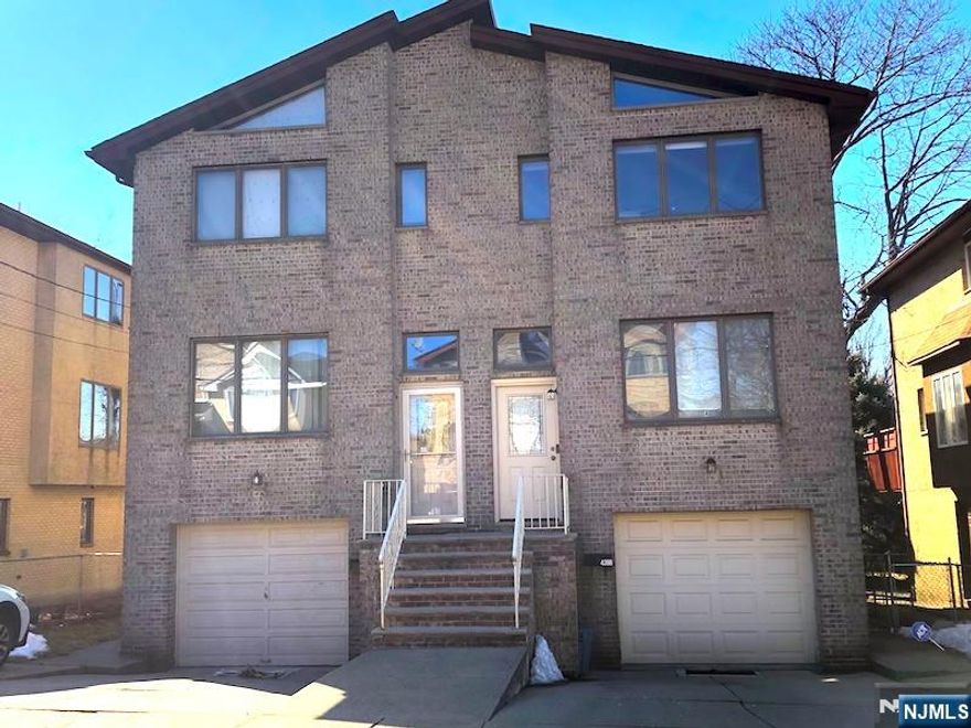 Renovated(built 1989) 3 bedrooms & 3.5 bathrooms half of all brick duplex!Facing east bright unit on quiet residential street!2000 sq.ft of open & spacious layout for good entertaining!Marble floor on 1st floor & hardwood floor on 2nd floor & tiled floors on ground floor!Huge living room & relaxing dinning room w/designer lighting!Modern white kitchen w/back splash and ss appliances!Direct access from kitchen to deck!Master bedroom w/cathedral ceiling!Extra 2 bedrooms are good size w/ample closet space!2nd floor both bathrooms are upgraded!Finished ground floor with den/home office & full bath is perfect for extended family living style!Privately fenced backyard is ready for spring flower & vegetable garden!Recessed lights in living room & kitchen & master bedroom & corner bedroom!1C garage plus 2C driveway parking spaces!New washer & newer dryer!Close to westview park for playing & swimming & basketball!Close to transportation & food shopping & elementary school #3!