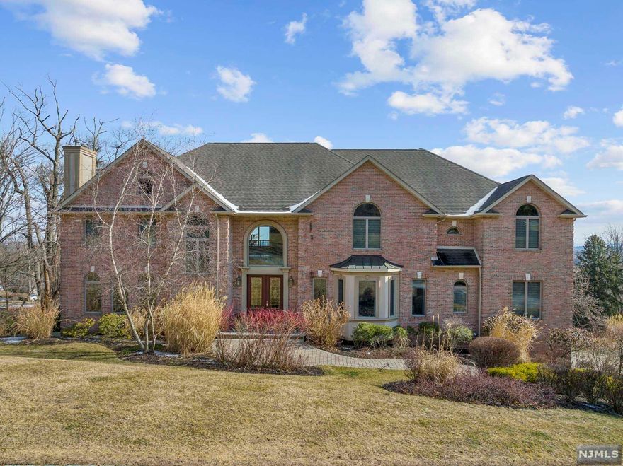 Nestled in an EXCLUSIVE private gated community in West Orange your future home awaits you. Upon entry to the Grand Foyer, you'll be welcomed w/ traditional styling accented by gleaming natural light throughout every corner of this freshly painted home. Appointed with Top-of-The-Line finishes. A Chefs kitchen w/ Viking & Miele appl, 4 fireplaces, radiant heat marble floors, 5-zone heat/AC system. A built-in surround sound system for all your entertaining needs. 2well-appointed BDRMS on the 1st fl and 4 addtnl on the 2nd fl. Spacious primary suite showcases custom built-in walk-in closets, wet bar & fireplace. The ensuite bath features steam & rainfall shower. The sun-drenched ground floor offers ample entertaining w/ indoor/outdoor access. Also features a home gym, oversized media room w/fireplace, game room, full bth, storage & direct access to a 3-car garage. Nearby downtown Montclair, Millburn & South Orange Close proximity to parks, and shopping malls. Short commute to NYC.