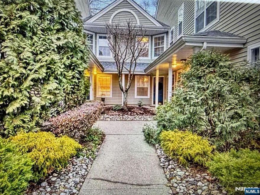 Picture perfect is the only way to describe this light-filled and spacious, condominium. Located in the desirable Padding Square, this 2 bedroom 2 full bath condo offers main floor living at its finest. That's right - NO Steps! This unit features a relaxed entertaining open floor-plan that is sun-filled & spacious! Other feature include hardwood flooring, recessed lighting throughout, a comfortable modern eat-in kitchen with all nice stainless steel appliances, a dining and living/family room that flows nicely from the kitchen, a spacious primary bedroom w/full bath and walk-in closet, plus a 2nd bedroom with an adjacent full bath! As an added bonus, you have a private rear patio and yard with woodland backdrop and the parking spot for this desirable lifestyle is just steps away. Get excited...This warm and inviting home is awaiting your arrival!