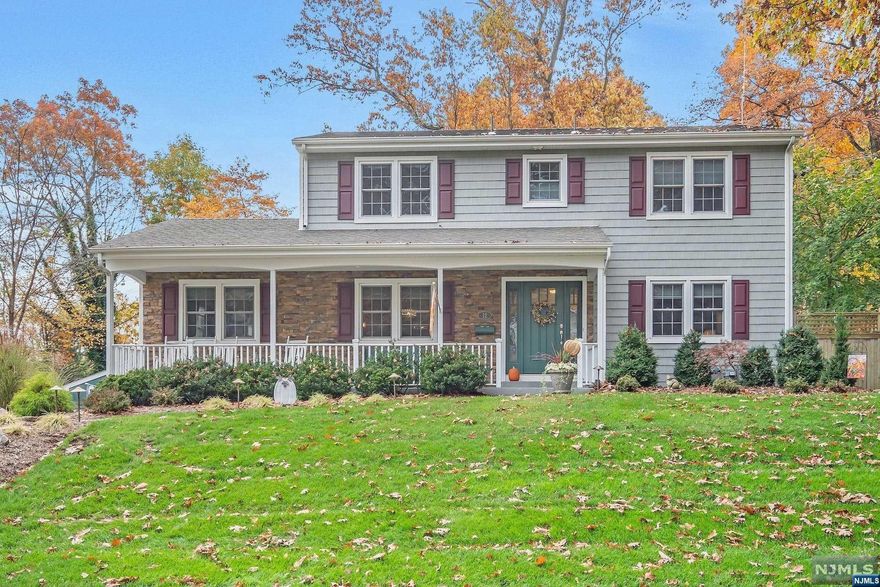 True Gem!!Located in a fantastic neighborhood sits this 4-bedroom 2.5 bath turnkey center hall colonial. Conveniently located to NYC trans, schools and parks. Beautiful, professionally landscaped in 2022 with new front walkway and lighting creating amazing curb appeal. Offering a great floor plan which makes entertaining a delight. Large front to back living room/Fpl and a spacious formal dining room. The newly renovated kitchen is absolutely amazing with stainless steel appliances, farm sink, microwave drawer, quartz countertops, island cart with a bar area with stools opening to a family room. The all-season sun porch takes you to a very private 6ft fenced backyard with inground pool (Liner replaced in 2017) Grass multi-purpose yard as well. 2 car attached garage with plenty of extra parking spaces. Refinished 2nd floor hardwood (2022), freshly painted 2nd floor, CAC, Sprinklers, wired for SmartThings, ceiling speakers, ProWeatherStation and much more. This home will not last