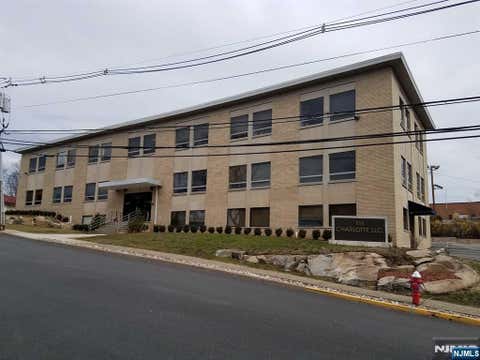 Photo of 111 Charlotte Place #201A, Englewood Cliffs, NJ 07632 (MLS # 26028326)