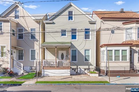 Photo of 1048 22nd Street, Paterson, NJ 07513 (MLS # 25037745) Photo of 1048 22nd Street, Paterson, NJ 07513 (MLS # 25037745)