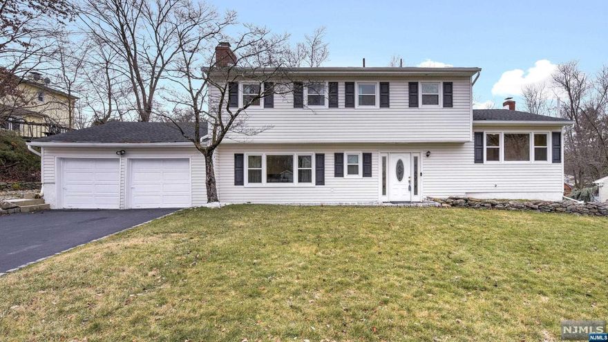 Move Right In!! Completely Updated home in a Great Neighborhood!! 4 BR, 2.5 Bath w/ 2 Car Garage. Foyer w/ 2 Coat Closets. Updated Powder Room(2014), Updated Eat in Kitchen(2016) w/42" Cabinets, SS Appliances, Granite Ctrs, Walk out through French doors to lge Florida Rm w/Brand New Flooring(2022), Lge Dining Area, Family Room W/ Newer Gas Fp & Accent Brick Wall(2014), Huge Formal Living Room. Master Bedroom w/ Recessed lighting, Walk In Closet & Updated Master Bath(2022) w/ Walk in Shower. 3 other Spacious Bedrooms in the 2nd Flr. Updated 2nd Bath(2022) w/Double Sink, Smart Toilet, Lge closet & Tub Shower. Lge Mudroom & Laundry Room. Recessed Lighting Throughout. HW Flrs through out except Kitchen & Foyer. Finished Basement & Storage Room. Spacious Back yard w/Privacy Fence & Storage Shed(2022). In ground Swimming pool w/ Newer Liner(2018), Filter & Motor(2016). Updated Furnace, Water Heater& AC(2019),Water Softner(2016), Roof, Gutters(2012), Windows(2014).Close to Park & Ride.