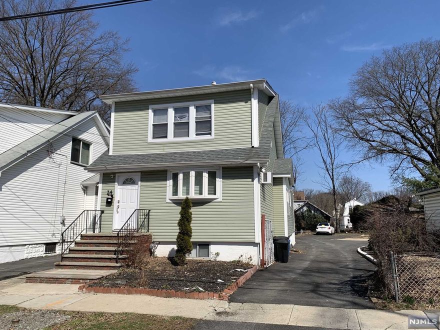 Recently renovated in 2020, this home, needs nothing but a motivated buyer to move in. 1st floor Kitchen has been renovated and includes stainless steel appliances. Hardwood flooring through-out. Huge Back-yard with PLENTY of off street parking for about 10 Cars! Basement is half finished. Close to all major highways and Train Terminals. A commuter's Dream!!! NO more showings highest and best is due Monday 6pm