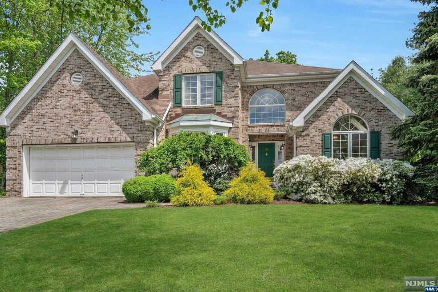 Turn-key classic center hall colonial in Applewood Estates with beautiful curb appeal & views of the Ramapo Valley Mountains. A welcoming two-story foyer leads to a fabulous open floor plan. The living room seamlessly connects to the dining room, an office with French doors offering privacy, the family room features a cozy wood-burning fireplace and is adjacent to the spacious eat-in kitchen with access to the private deck, patio and yard for nice outdoor enjoyment. A practical mudroom leads to the two-car garage. Upstairs, the generously-sized primary bedroom offers a tray ceiling, two walk-in closets, and a large bath, three additional bedrooms and a conveniently positioned laundry room. The lower level presents a great opportunity for customization with its large open space. Residents of Mahwah enjoy top schools, outdoor activities at Ramapo Valley Reservation and Campgaw Ski Resort, and excellent dining options. This beautifully maintained home is ready to welcome you.