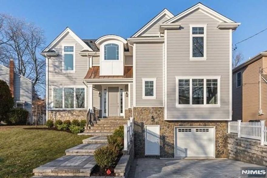 This stunning home, built just five years ago, boasts modern design and spacious living areas. The main level features a formal living room, and a banquet-sized dining room. The open-concept kitchen seamlessly flows into the family room, creating a warm and inviting space for daily living and entertaining. Additionally, there's a bedroom and full bathroom on the first floor, offering flexibility for guests or multi-generational living. Upstairs, the expansive primary suite is complete with an en-suite bathroom and ample closet space. The second floor also includes four additional bedrooms, two full bathrooms, and a well-positioned laundry room for ease and convenience. The finished basement adds even more living space with its large recreation room. Two additional bedrooms and a full bathroom offer plenty of space for guests, teenagers, or home offices. The basement also includes access to a one-car attached garage, and a mudroom. The backyard is fenced in and has a nice sized patio. The home has a generator, underground sprinklers, alarm system and muti-zone HVAC. Photos are from previous listing.