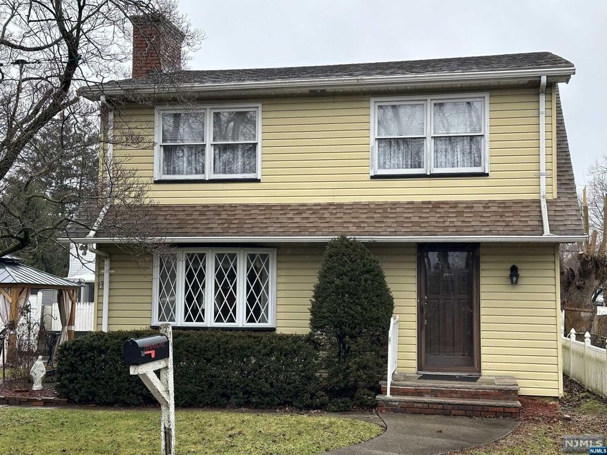Welcome to this charming Colonial style home Boasting 3 Bedrooms and 2 full Baths, offering comfort and functionality. living room featuring a wood burning fireplace, spacious Dining room.. Hardwood floors throughout, Central air, Central Vac,Central Attic Fan, Baseboard heat, Lots of Closet space