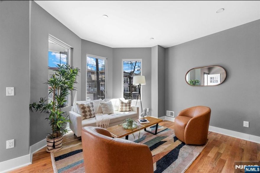 Wake up to NYC skyline views from your own private floor in this two-level Bergen-Lafayette condo featuring 4 beds, 3 full baths and a rare full-floor primary ensuite retreat. Bright open layout with oversized windows, high ceilings, and spa-like baths. Commuterâ€™s dream near Light Rail, NYC access, and Liberty State Park.