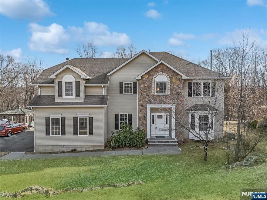 Step into this stunning 4-bedroom, 2.5-bathroom colonial, beautifully renovated in 2024 and nestled in a fantastic neighborhood. With high ceilings and abundant natural light, this home exudes warmth and elegance. The main bedroom features a private ensuite, while the newly remodeled bathrooms add a touch of modern luxury. The gorgeous kitchen boasts new quartz countertops and stainless steel appliances, perfect for entertaining. A spacious finished basement with a walkout offers endless possibilities, and a backup generator provides peace of mind. Don't miss this move-in-ready gem!