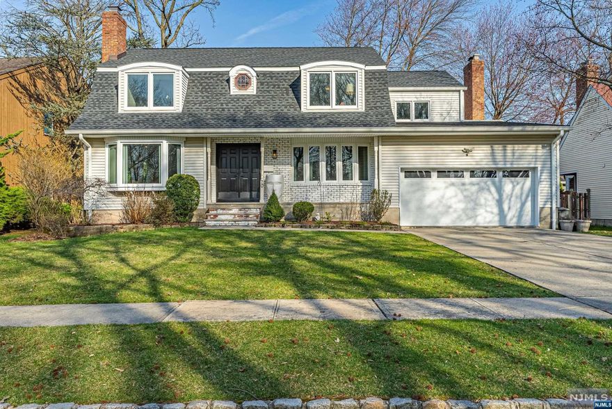 Welcome to this unique home on a quiet cut-de-sac in the beautiful town of River Edge. Custom built by the builder to live in w steel beams & 8 ft ceilings in the basement. As you enter the home you are greeted by an entry foyer w custom cement flooring, 1st floor bed, luxurious family room full of sunlight w wood burning fireplace, dining area, large eat-it kit w commercial grade stove/griddle, plenty of cabinets w an island, large living room w another fireplace, new half bath & laundry room. 2nd floor includes 3 large beds, fbath, primary bed w cathedral ceilings, large closet & newly updated primary bath. Hardwood floors throughout, 7 zone heating w Nest Thermostats, central AC, central vac, roof is 3 years old, hot water heater is 1 year old, AC is 2 years old. Amazing full finished basement w high ceilings, game room, exercise room, sauna, plenty of storage, guest room, fbath & access to the 2 car garage w tons of storage. Nice yard & deck w remote retractable awning.