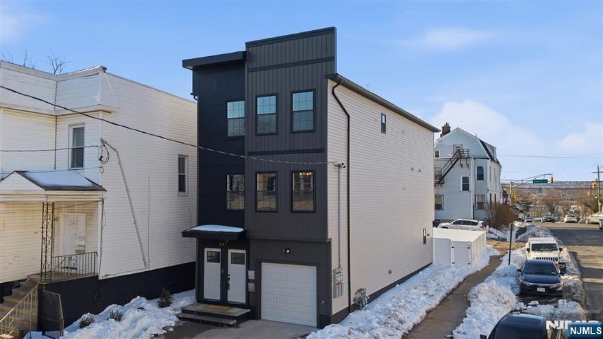 Turn this brand new 2 family into an income-producing asset. Ideal for an owner occupant or an investor. This brand new construction 2-family has 7 bedrooms and 4.5 bathrooms across two thoughtfully designed units. Each unit features a spacious master ensuite, open-concept living, and a modern kitchen with sleek cabinetry, quartz countertops, and a center island that flows seamlessly into the dining and living areas. This modern two family also Includes an attached garage, pre-installed security system, and a new construction home warranty for added protection. With a 5-year tax abatement and eligibility for CRA low-interest financing, this is a rare opportunity to secure favorable terms while building equity in a commuter-friendly location just 20 minutes from NYC.