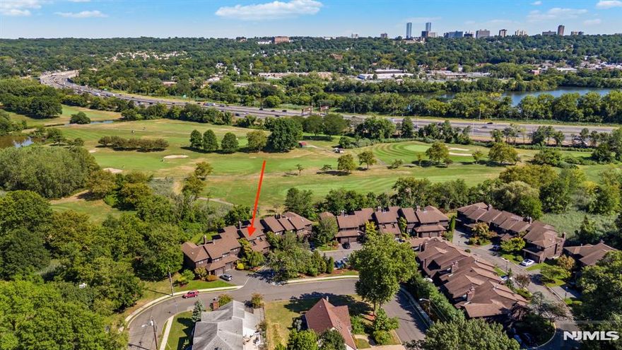 Do NOT miss this rare opportunity to own a beautiful, one-owner townhouse in one of Teaneckâ€™s most sought-after locations! Purchased directly from the original developer and lovingly cared for ever since, this home offers the perfect blend of comfort, convenience, and lifestyle. Featuring 2 spacious bedrooms and 2.5 bathrooms, this residence is designed for todayâ€™s living. The oversized living and dining room with dramatic floor-to-ceiling windows fills the home with natural light and frames stunning views of the Overpeck Golf Course. The large eat-in kitchen is ideal for both casual meals and entertaining friends and family. Highlights include a private attached garage, ample storage throughout, and a thoughtful layout that combines functionality with style. Located just minutes from NYC and Fort Lee transportation, and close to shopping, dining, and local amenities, this home truly offers the best of both worlds, peaceful surroundings with unbeatable accessibility. Move right in and start enjoying everything this exceptional townhouse has to offer. Opportunities like this in Teaneck DO NOT come along often!