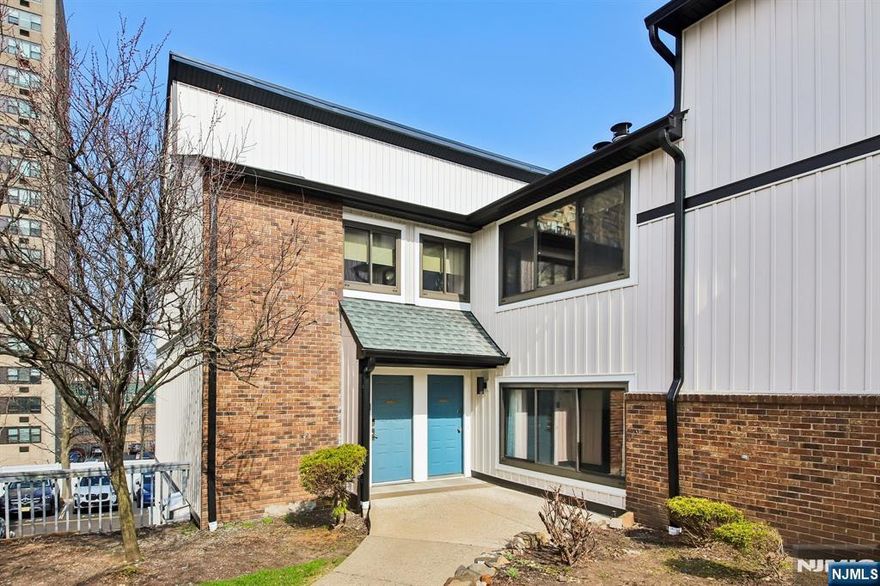 This three bedroom condominium in the Cedar Court Complex should not be missed. It's a rare opportunity to live in this newly renovated complex in the desirable town of Fort Lee. This bright and spacious home with views of the beautifully landscaped interior courtyard and pool is just perfect. You'll look forward to calling this cozy and relaxing home while enjoying the wood burning fireplace. There is a huge balcony that spans from the kitchen to the dining room. The primary bedroom includes a second balcony and ensuite bathroom. This unit also includes central air conditioning, laundry in the unit, indoor and outdoor parking, and lots of closet space. Minutes from the George Washington Bridge, the Fort Lee Recreation Center, and Community Center.