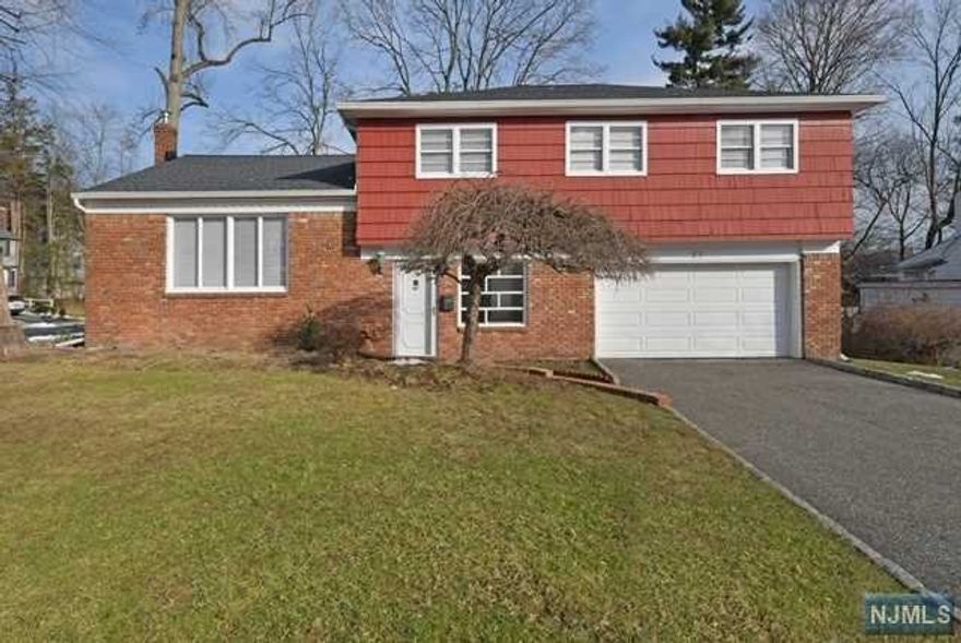 Welcome to this beautiful split level corner lot home in the desirable town of West Orange. Featuring four spacious bedrooms, two in a half bathrooms, master bedroom with master bathroom, eat in kitchen with new gas range\oven and new microwave. Dining room and living room, hardwood flooring throughout, family room on the ground level with powder room, leading you to the backyard with patio perfect for entertaining. New roof, new electric panel 200 amps and new hot water heater. Windows as is. Seller leaving additional refrigerator in basement. Commuters delight to New York, close to schools, house of worship and major highways. Come see this lovely home it won't last!!