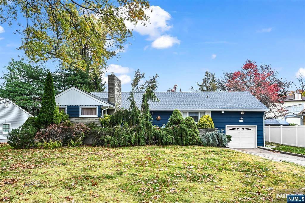 Photo of 1061 Roosevelt Avenue, New Milford, NJ 07646 (MLS # 25033074)