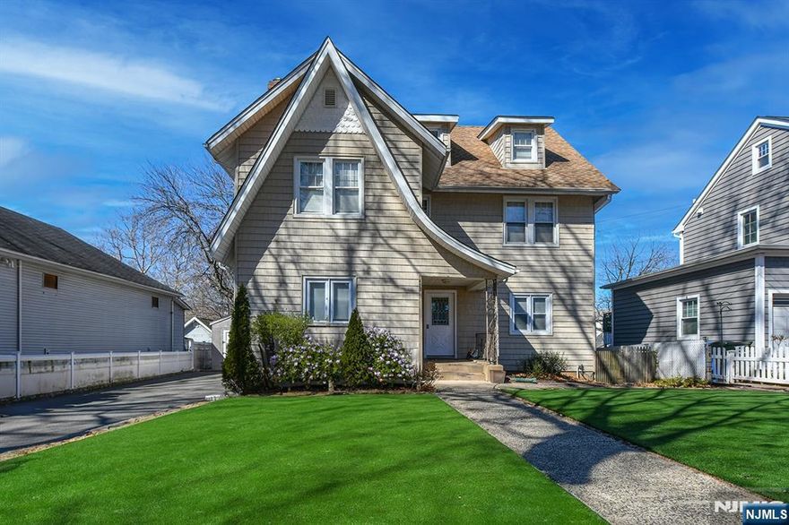 Welcome to this Newly Renovated 2-bedroom, 1-bath 1st Floor Unit with Smart Features and Nice Size of Backyard! This bright and spacious beautiful unit features a bonus room/office den, new windows, flooring, and a modern bath with a rain shower and luxurious bidet. Enjoy a gourmet kitchen, formal dining room and a living room with an electric fireplace. Additional perks include newer appliances, basement storage, washer/dryer, and an electric car charger and smart home features: smart lighting, AC, door lock, and thermostats. Yard access and one driveway parking spot add to the convenience. Prime location with easy access to NYC buses and train. Don't miss this great rental!