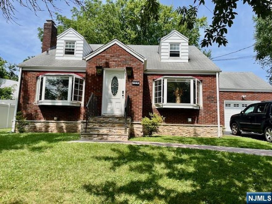 Beautiful, renovated home! New kitchen with tile ceramic and marble countertop, new sleek stainless appliances and modern finish. One bedroom and a newer full bath on the first floor and two bedrooms with a new full bath on the second floor, newer closets and plenty of extra storage. Finished basement with a newer half bath. All windows are new, including 2 beautiful bay windows. This tastefully design home blend elegance and functionality with three zones heating. The rear sunroom with A/C, sliding door to nice size backyard with modern paving design. A newer driveway for 3 cars plus a new garage door. This is a beautiful and very unique house!!