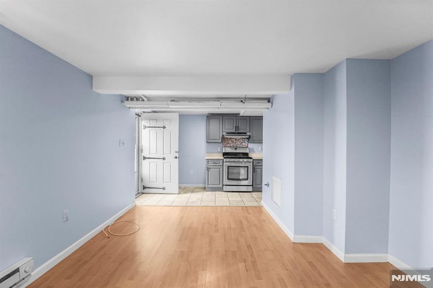 Welcome Home! This charming 2 Bedroom 1 Full Bath home is a commuter's dream in Garfield NJ. Bus Stop is at the corner of the block to NYC. This home provides a renovated kitchen, SS fridge, & plenty of cabinet space. NEW Washer & Dryer Conveniently in unit. Walk in Closet with plenty of space for storage. Recess lights throughout. Walk to NJ Transit Train station only 8 minute walk to NYC Penn Station. Section 8 Welcomed.