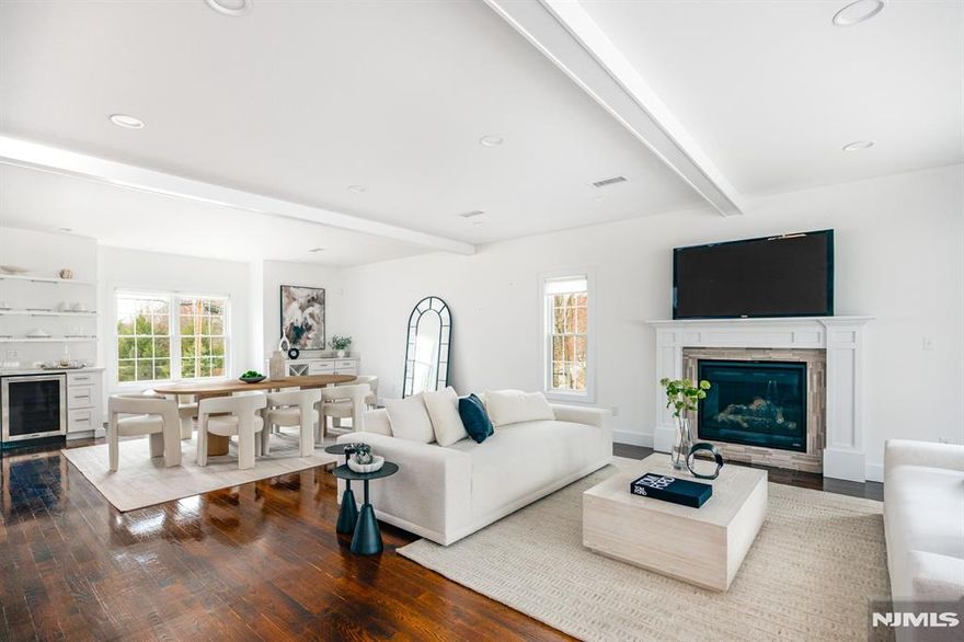 Experience modern elegance at 2 Bona Court, Park Ridge. This stunning, newly built home sits on a 1-acre lot and offers approximately 4,400 sq. ft. across the first and second floors, plus an additional 1,900 sq. ft. finished basement with egress windows. Featuring 6 bedrooms, 5 full bathrooms, a 3-car garage, and an open floor plan, this home blends space, style, and convenience. Enjoy an outdoor deck and a spacious backyard, perfect for entertaining or relaxing. Located in a highly accessible town, this home offers easy access to major highways, NYC transit, and local amenities. Wood Dale County Park is just moments away, providing a perfect spot for outdoor recreation. Park Ridgeâ€™s charming downtown features a variety of dining, cafes, and shops, making it an ideal place to live. With its prime location and high-end features, 2 Bona Court is an exceptional opportunity in Bergen County.