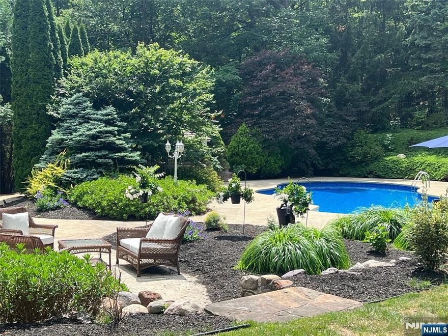 Experience Resort-Style Living In This Exquisite 4 Bedroom, 2.5 Bath Custom Estate Situated On Just Under 5 Acres In A Quiet Cul-De-Sac Only 1 Hour From NYC! A Grand 17Ft Two-Story Foyer With Custom Paneling & Tile Flooring, Sets A Tone Of Elegance The Moment You Enter! The Main Lvl Features A Home Office Equipped With Custom Built-In Desks & Cabinets As Well As Radiant Heated Tile Floors! Follow Through To A Sun-Drenched Kitchen With Large Center Island & Bar Seating, Plus A Charming Breakfast Rm Framed By A Canted Bay Window & Tile Flooring! The Sophisticated Living Rm Offers A Beautiful Gas Fireplace, Hardwood Floors & Multiple French Doors Leading To A Stunning Paver Patio & Heated In-Ground Pool! Also On The Main Fl: A Formal Dining Rm, Leisure Rm, Powder Room With Dramatic Onyx Walls, And A Laundry Rm With Custom Cabinetry! Upstairs, All Four Bedrooms & Beautiful Hardwood Floors Await, Including A Vaulted-Ceiling Primary Suite Retreat Featuring A Walk-In Closet & A Spa-Like Bath W/Dual Vanity, Oversized Soaking Tub, & Spacious Walk-In Shower! The Expansive Lower Lvl Offers A Finished Rec Rm With Direct Access To The 2 Car Garage! Perfect For A Gym, Game Room, Home Theater Or Whatever You Dare To Envision! Step Outside To Your Private Oasis, Complete With Gazebo, Pool House Cabana W/Half Bath & Shower, And A Bocce Court Perfect For Entertaining Or Relaxing In Style! A Rare Blend Of Luxury, Space, And Convenience! Come See This Magnificent Home Today!