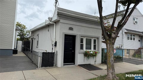 Photo of 141 Monroe Street, Garfield, NJ 07026 (MLS # 26038556)