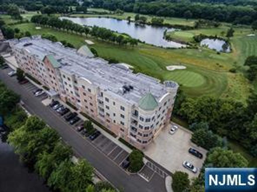 Beautiful luxury condo in desirable location with Bright East south view through large windows. Top floor. Newly installed engineering wood floor through out. Kitchen with cherry wood cabinet, granite counter top with an adjoining dining area & stainless steel appliances. The Living room is enhanced by a 9 foot ceiling, and sliding glass doors to an outdoor terrace. walk-in closet in Master Bedroom. Master bath with double sink, separate glass shower, granite & marvel floor. Both rooms are facing east south. This Condo is privacy, calm, silence. Full size Washer/Dryer in the unit. Plenty of visitor parking spots. Club House with a fireplace, kitchen/party area, gym and relaxing room. Direct access from Rt. 4 and 5 min. driving distance to G.W.B. Close to I-80 & I-95. Also close to bus stop to NYC.