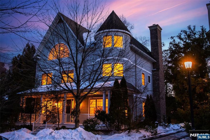 You'll be wowed by the space and scale of this striking contemporary Victorian/Colonial from the moment you step onto the welcoming front porch. Inside, generously proportioned rooms, high ceilings, and an easy, flowing layout create a home that is both grand and comfortable. The first floor features an inviting foyer with a spacious living room on one side and a formal dining room on the other, seamlessly connected to a butler's pantry and a large chef's kitchen with center island, two sinks, and generous eat-in area. A comfortable family room with gas fireplace and sliders to the backyard sits just off the kitchen. Tucked away laundry room and powder room complete this level.Second floor offers three spacious bedrooms one with an en suite bathroom, another full bathroom plus a luxurious primary suite with gas fireplace, double walk-in closets, and an oversized bath with jetted tub and separate shower. The third floor continues to impress with tall ceilings, a Palladian windows, expansive living space currently set up as a gym , an additional bedroom, den, and full bath ideal for guests, work, or recreation. A high ceiling finishable basement offers endless potential. An elevator services all 4 levels of the home, from the basement through the third floor, adding both convenience and long-term accessibility.