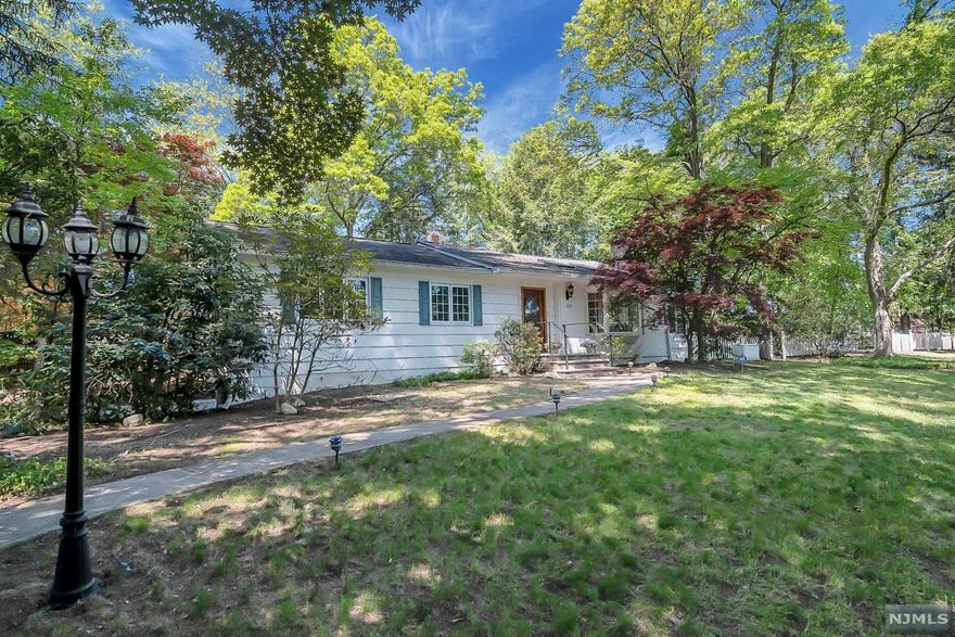 Lovely sunlit home that exudes warmth and charm. Enter into the bright entrance foyer which is open to the cathedral ceiling, skylit living room with FPL/builtins. Dining room overlooks deck and opens to the wood beamed family room with a wall of windows overlooking the heated gunite pool. Modern kitchen with Viking stove/marble counters/skylight and door to deck. Lower level with second family room FPL/builtins, full bath and multifunctional spaces to suit your needs. Other wonderful features include a whole house generator, 4 year old furnace, 4 year old hot water heater, security system and newer pool heater. Home is in need of a little TLC, yet has a wonderful layout for entertaining indoors and out and is surrounded by homes of higher value. So much potential here and located on a beautiful street in the highly regarded community of Ho-Ho-Kus.
