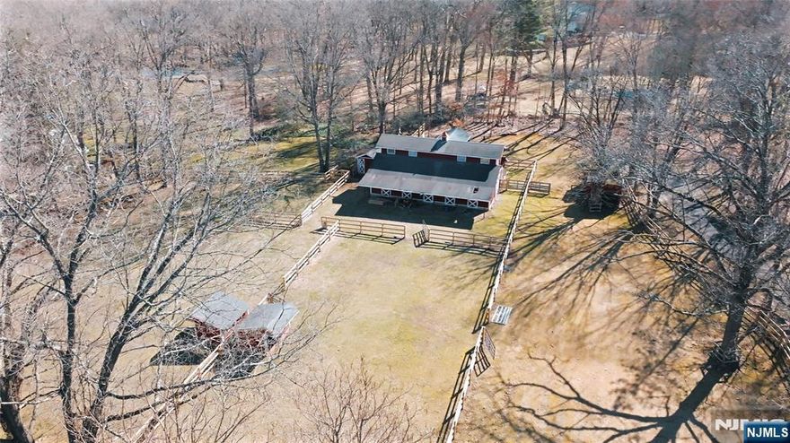 Discover the possibilities of this picturesque 3-acre property, perfectly positioned in the highly sought-after town of Saddle River. Offering a serene and private setting, this unique property presents an exceptional opportunity to create a custom luxury estate or embrace its equestrian potential. Equipped with a well-maintained barn and newly fenced acreage, this property is ideal for those who appreciate the charm of country living while being just moments from dining, shopping, and top-rated schools. Whether you envision building your dream home or using it as an equestrian retreat, this expansive lot provides the perfect canvas. The existing colonial farmhouse is being sold as-is, as the seller will not be obtaining a CCO.