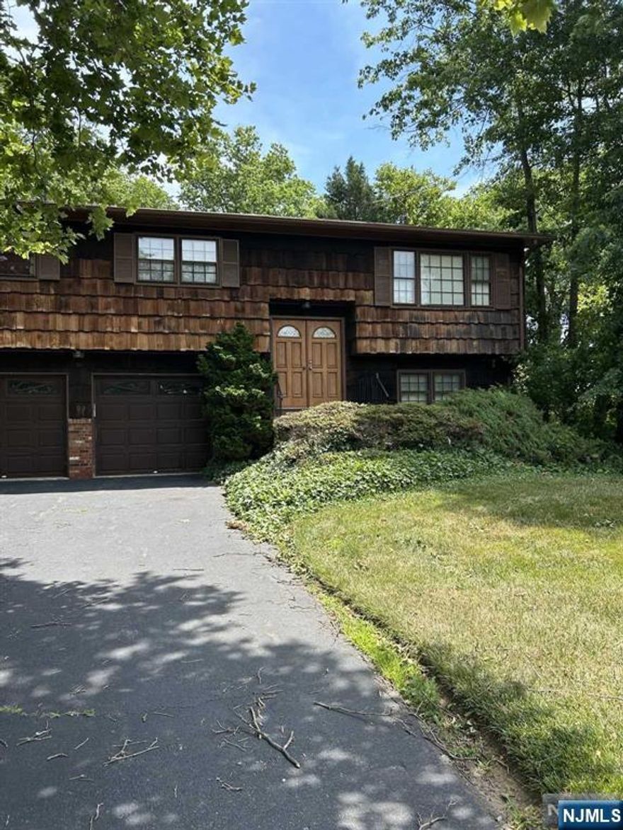 Welcome to this beautifully maintained residence. This spacious home offers the perfect blend of comfort, style, and convenience. Ample living space this inviting home boasts 4 bedrooms and 2 bathrooms, providing plenty of room for family and guests. Finished lower level for additional living space or recreation. Attached garage with ample storage and lower level entry. This property is brimming with potential and is perfect for those who are ready to infuse it with their personal style and touch. Whether you're looking for a DIY project or a home you can tailor to your specific taste, offers a blank canvas to create your dream space.