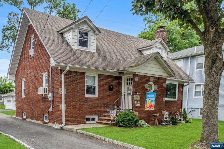 WELCOME TO THIS WELL CARED FOR BRICK HOME, 4 BEDROOMS 2 UPDATED BATHS,LOCATED IN ONE OF THE MOST SOUGHT AFTER AREAS OF HAWTHORNE ,CLOSE TO GLEN ROCK BORDER VESTIBULE ENTRY/GUEST CLOSET,LR/FPL,SPLIT AC SYSTEM.COUNTRY KITCHEN/PANTRY,PLUS OUTSIDE ENT.TO LARGE OPEN PORCH,2 BRS,1 UPDATED BATH,SECOND FLOOR HAS 2 BEDROOMS,1 UPDATED BATH. FULL FINISHED REC.ROOM WITH BILCO DOORS TO BACKYARD.HARDWOOD ON FIRST & SECOND FLOORS. 2 CAR DETACHED GARAGE. AMAZING PROPERTY 50X218. LOTS OF CLOSETS AND STORAGE. A MUST SEE HOME.WILL NOT DISAPPOINT.HOME WARRANTY IN EFFECT