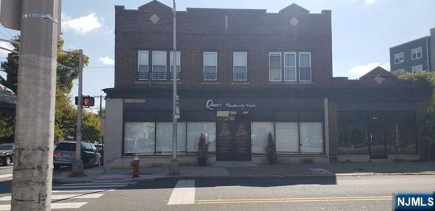 Don't miss out on this gorgeous brick mixed use corner property in the desirable Greenville section of Jersey City. This golden opportunity of a property features 2 beautifully renovated commercial spaces with bathrooms that could be used for many different purposes and Two 2-bedroom apartments with hardwood floors throughout and stunning kitchens with stainless steel appliances. Breathtaking views of the New York City Skyline, high visibility, exposure to commuter foot traffic and only minutes away from the Light Rail, Municipal Complex, Police Department, Retail and Restaurants. This is a thriving up and coming area where opportunity abounds, and where many impressive new builds are evident throughout. Potential for expansion. POF required before showings. SPECIAL FINANCING AVAILABLE!