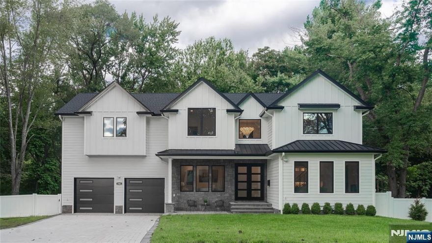 Nestled along the Ridgewood border is this impressive, brand-new construction masterpiece that has become part of the modern luxury in Glen Rock. Another masterfully built home by Skill Custom Homes quietly reflects true interior design vision & high-end craftsmanship. A Colonial style home, on existing foundation, showcases a cohesive floor plan with 10â€™ ceilings, white oak flooring & an exquisite switchback staircase. Bluestone Cambridge paver driveway. Direct access 2-car garage with soaring ceilings. Chefâ€™s kitchen is a showstopper with white cabinetry, Sub-Zero/Wolf/Miele appliances & a 10' island with waterfall Calcutta Gold Quartz. A 2-story foyer, great room with FP, formal living & dining areas offer a seamless flow for living & entertaining. Opulent design touches, layered textures, & curated finishes elevate every space with timeless elegance. The luxurious primary en-suite features 2 WICs & a spa-like bath with a huge glass shower, soaking tub & double vanity. The 2nd en-suite has a tray-ceiling, linen closet, and frameless shower doors. The 3rd & 4th bedrooms share a Hollywood bathroom with double sinks and a water closet. The finished lower level is perfect for a gym, rec-room, or guest suite. Glen Rock offers top-rated schools, including a blue ribbon elementary school, a vibrant downtown, train service to NYC, and a walkable community, making it one of Bergen Countyâ€™s most cherished towns to call home * OPEN HOUSES - TBA *