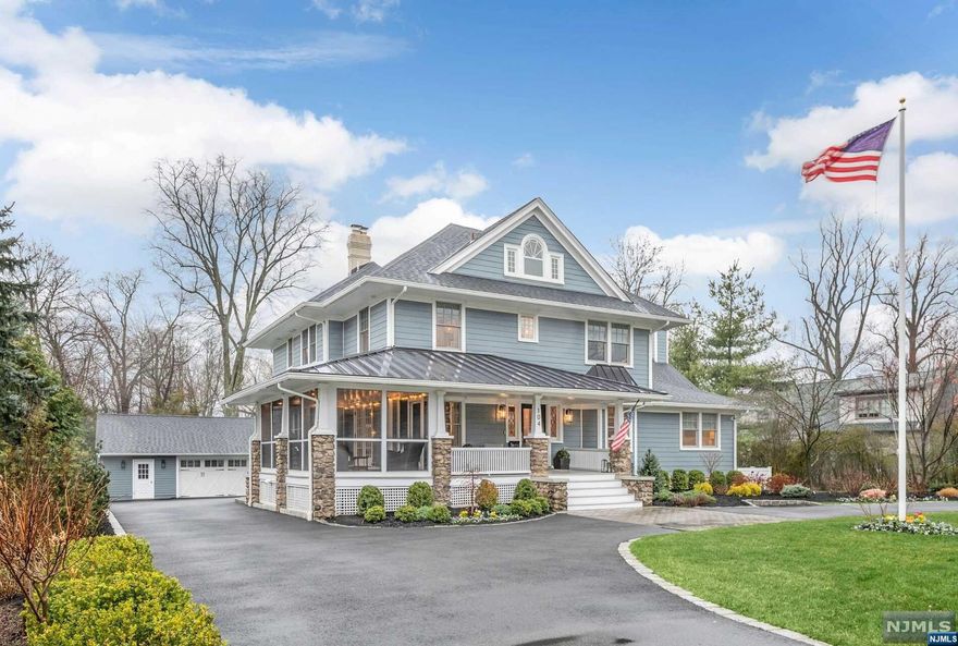 Nestled on a prime street in the heart of Ridgewood, a rare gem awaits discerning buyers seeking luxury, sophistication, and unparalleled comfort. This fully renovated and expanded masterpiece, completed in 2021, boasts a commanding presence on lush water-view grounds. The thoughtful renovation and expansion of this home exemplifies a commitment to excellence and a deep appreciation for both the art of living well and the preservation of beauty. Highlights include gourmet kitchen with Calacatta marble countertops, Wolf and Sub Zero appliances, banquet-size dining room, large family room w/ vaulted ceiling, first floor guest bedroom w/ full bath, mudroom, powder room, walk in pantry w/ high end appliances. Second level includes a large primary suite with stunning views, two bedrooms w/ jack and jill bath, and BR w/ ensuite bath. Sunlit third level w/ bedroom and bath. Finished lower level features high ceilings, office/7th BR, full bath, custom kitchenette, gym, and storage.