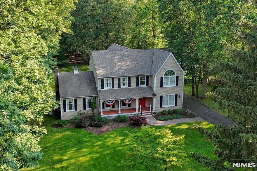 Welcome to Wyckoff with this classic Sicomac beauty on over an acre! This center hall colonial has 4 bedrooms, an office/guestroom, 3 full baths, 2 car garage and gorgeous, oversized composite deck that overlooks the flat, quiet, lush backyard. The main level flows seamlessly, featuring a gracious living room with a wall of bookshelves, spacious dining room perfect for entertaining, a 2-story great room w/cozy Fireplace. The modern white kitchen w/island is equipped with 6-burner Wolf range, other stainless steel appliances, pretty countertops and a Sub-zero wine/beverage refrigerator. There is a first floor Full Bath and a private Office/GuestRoom, too. The laundry room and mudroom have easy access to the garage, the backyard and easy flow to the main level. The 2nd floor has a huge primary bedroom suite that overlooks the backyard (it even has a private deck), with a fabulous walk in closet plus another wall of closets and spa-like primary bath (2021) with soaking tub, oversized shower and double vanity. 3 big bedrooms and full bath (2021) flank the roomy hallway with a roomy laundry room. The basement is partially finished and ready for fun. There are 2 oversized storage areas and many newer utilities. Enjoy all this classic home has to offer with the gleaming hardwood floors and large rooms right around the corner from Ramapo High School. Don't miss this classic, updated, turn-key home! Come see!