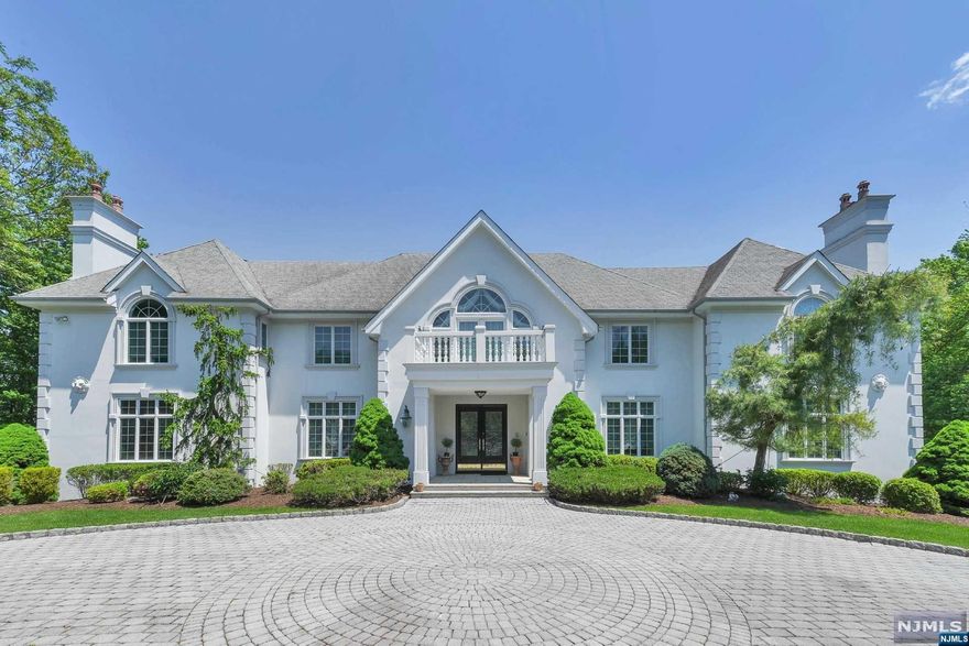 Gated custom built French Manor with circular paver driveway in sought after High Ridge area of town is situated majestically on 2 manicured acres with pool/spa/large paver patio and raised veranda offering spectacular views. Some of the elegant features offered include 6 fireplaces, extensive woodworking throughout, elevator to all floors and a 6 to 7 car garage. There is a large finished walk-out lower level with recreation room/fireplace, wet bar, gym, full bath and office. Wonderful floorplan, ideal for working remotely.