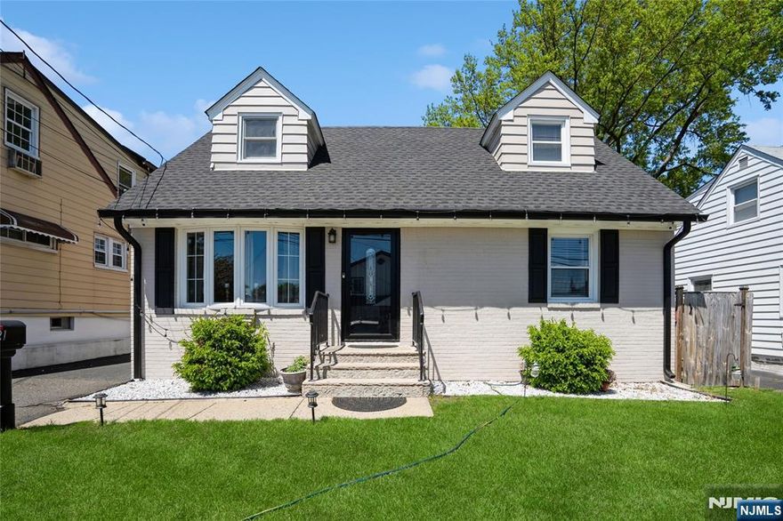 Welcome and be prepare to Fall in Love! with this Gorgeous and Meticulously care home in the heart of Elmwood Park. Enjoy proximity to top Schools,Parks,Shopping Malls,Public Transportation and Major Highways.NYC commuters dream! this Move in Ready Home Offers:main level Living Room, Dining Room(original a 5th bedroom)Renovated EIKIT.recessed ligthing,Bedroom(family room)full Bath,2nd level : primary Bedroom,full renovated Bath and 2 additional Bedrooms.full basemant with storage and laundry area,Private Backyard.,covered patio,storage shed, driveway for 2 cars. New Roof,gutters,water heater,C/A with split units and washer & dryer.Convenient Location and Low Taxes!